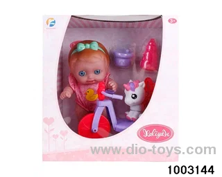 10-inch doll with bicycle in window box