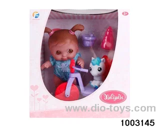 10-inch doll with bicycle in window box