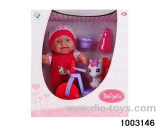 10-inch doll with bicycle in window box
