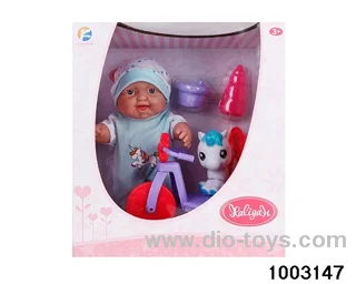 10-inch doll with bicycle in window box