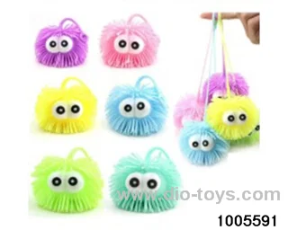 Luminous fur ball in display box