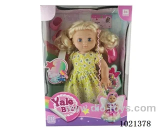 35cm doll with  ornament in window box