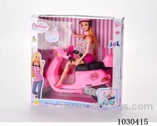doll & motorcycle  in color box