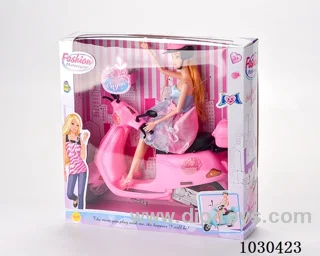 doll & motorcycle  in color box