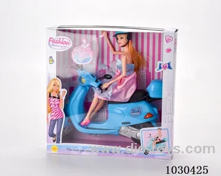 doll & motorcycle  in color box