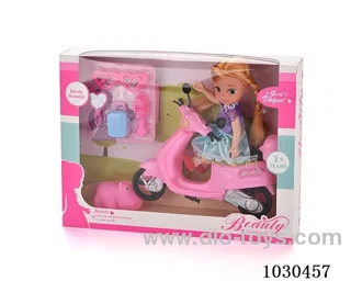 doll + motorcycle  in Window box