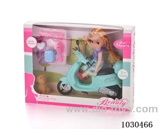 doll + motorcycle  in Window box
