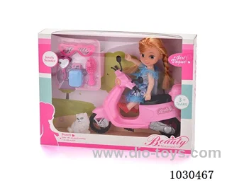 doll + motorcycle  in Window box
