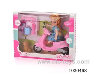 doll + motorcycle  in Window box