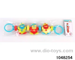 The baby pulls the clown with three hands in poly bag header