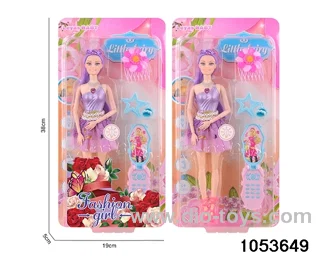 11 inch doll with light and music in clam shell