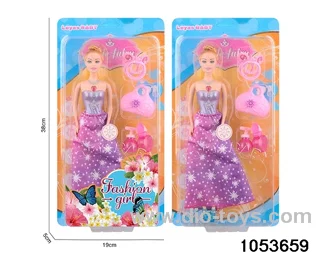 11 inch doll with light and music in clam shell