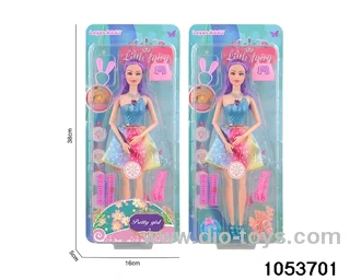 11 inch doll with light and music in clam shell