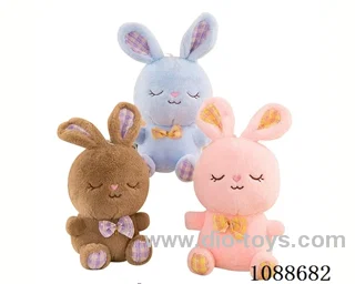 Rabbit doll with fur and squinting eyes