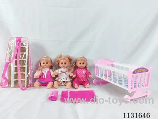 14 inch doll with English IC, plastic bed, pillow, quilt