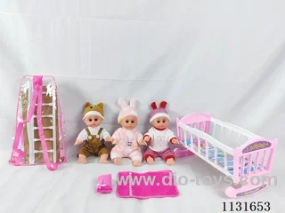 14 inch doll with English IC, plastic bed, pillow, quilt