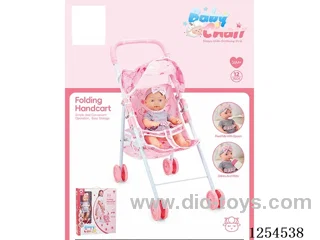 12 inch doll + sun stroller ( vinyl head hands and feet / body blowing)