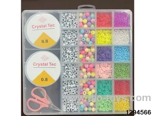 style box with 2 large 26-compartment heart-shaped beads, regular beads, small polymer clay beads, and fine beads.