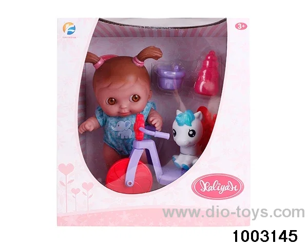 10-inch doll with bicycle in window box
