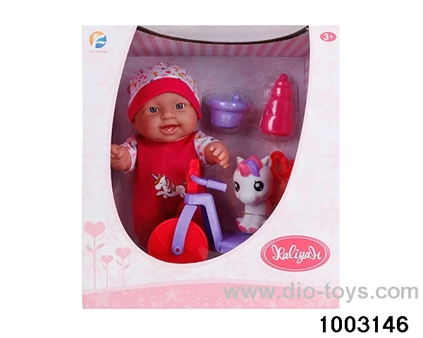 10-inch doll with bicycle in window box