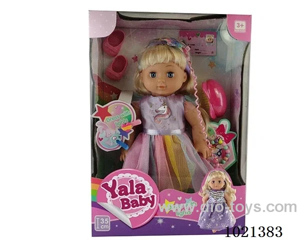 35cm doll with  ornament  &Dress with light in window box