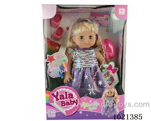 35cm doll with  ornament  &Dress with light in window box