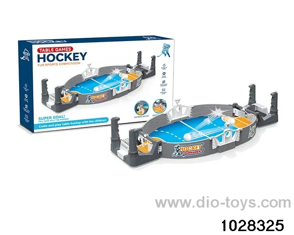 Two-player catapult field hockey against table games in color box