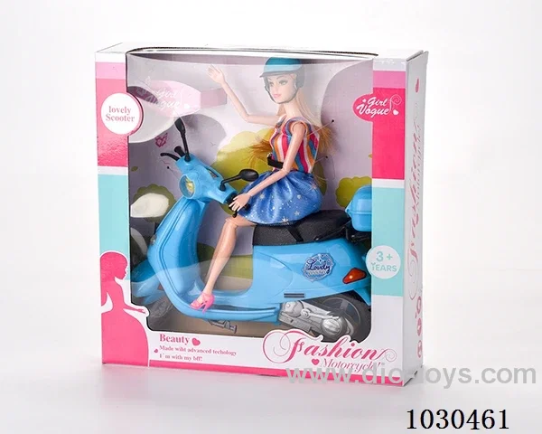 doll + motorcycle  in Window box