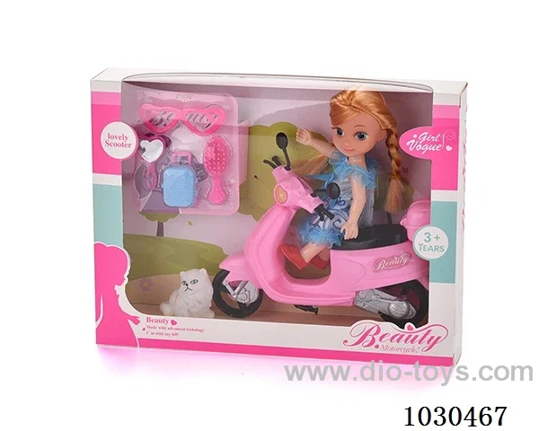 doll + motorcycle  in Window box