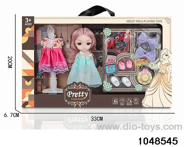 Doll changing suit in window box