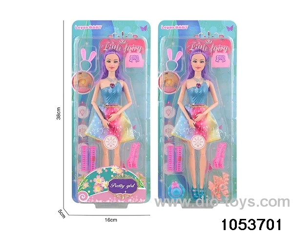 11 inch doll with light and music in clam shell
