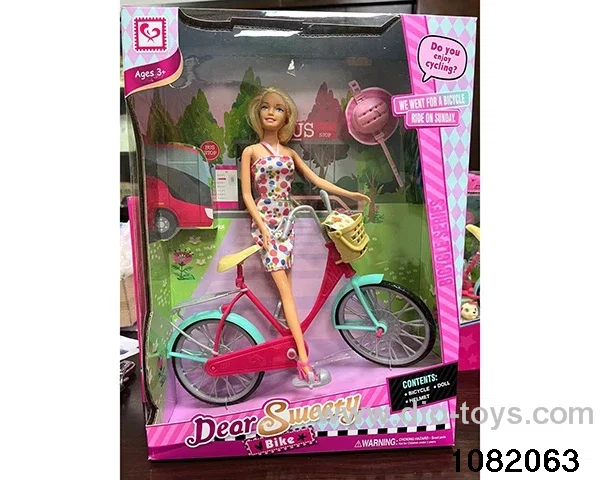 11.5 inch Barbie with Bicycle in window box