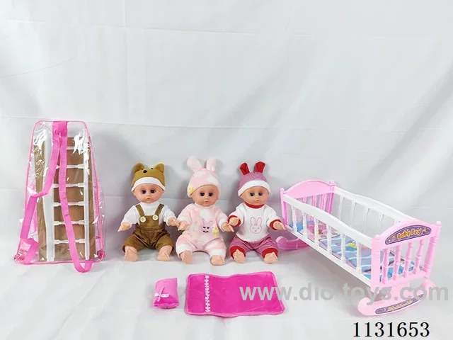 14 inch doll with English IC, plastic bed, pillow, quilt
