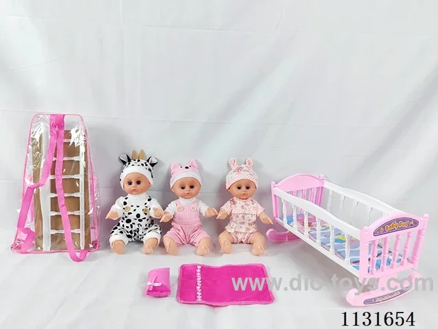 14 inch doll with English IC, plastic bed, pillow, quilt