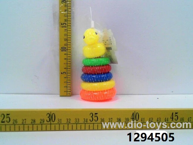 5 Small rings with yellow duck in net bag